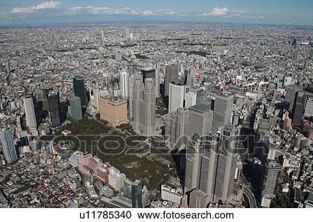 Stock Image - Aerial view of Shinjuku ward, Tokyo Prefecture, Honshu, Japan. Fotosearch