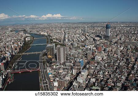 Aerial view of Sumida river, Sumida ward, Tokyo Prefecture, Honshu, Japan View Large Photo Image Stock Image - Aerial view of Sumida river, Sumida ward, Tokyo Prefecture, Honshu, Japan. Fotosearch