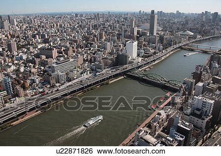 Stock Photograph - Aerial view of Sumida river, Taito ward, Tokyo Prefecture, Honshu, Japan. Fotosearch