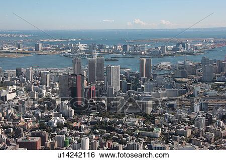 Stock Photograph - Aerial view of Tamachi station, Minato ward, Tokyo Prefecture, Honshu, Japan. Fotosearch