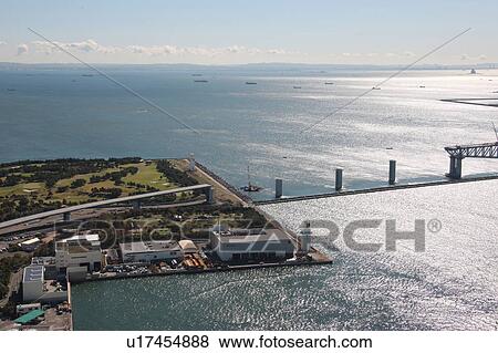 Stock Photo - Aerial view of Tokyo bay and reclaimed land, Koto ward, Tokyo Prefecture, Honshu, Japan. Fotosearch
