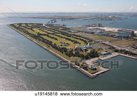 Stock Photo - Aerial view of Tokyo Bay and Wakasu golf course, Koto ward, Tokyo Prefecture, Honshu, Japan. Fotosearch