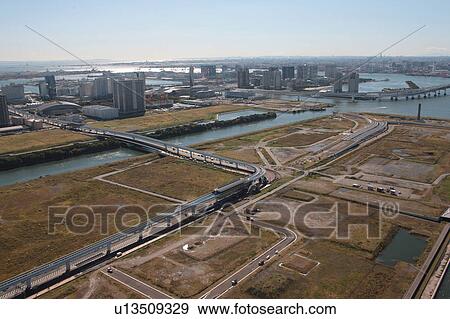 Aerial view of Toyosu, Koto ward, Tokyo Prefecture, Honshu, Japan View Large Photo Image Stock Photo - Aerial view of Toyosu, Koto ward, Tokyo Prefecture, Honshu, Japan. Fotosearch