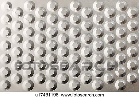Stock Photograph - Aluminum sheet with patterns. Fotosearch