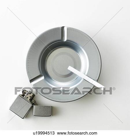 Stock Image - Ashtray, Lighter and Cigarette. Fotosearch