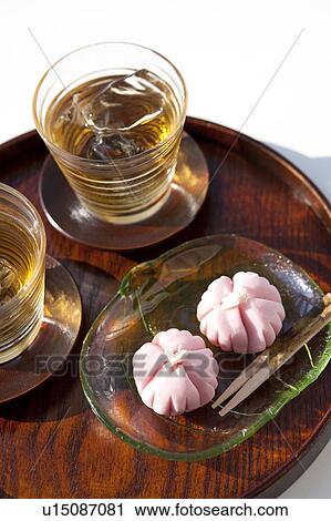 Barley tea and sweet food on tray View Large Photo Image Stock Image - Barley tea and sweet food on tray. Fotosearch
