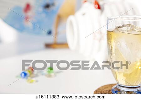 Stock Image - Barley tea, Insect Repellant and fan. Fotosearch
