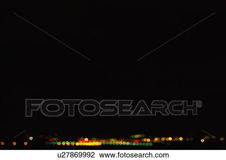 Stock Image - Blurred illumination at night, Osaka Prefecture, Honshu, Japan. Fotosearch