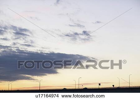 Bridge and sky at dusk, Tokyo Prefecture, Honshu, Japan View Large Photo Image Picture - Bridge and sky at dusk, Tokyo Prefecture, Honshu, Japan. Fotosearch