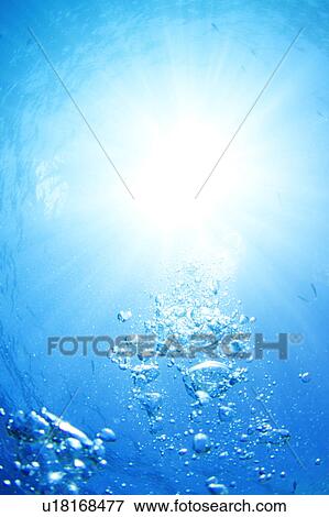 Stock Photo - bubbles, water, blue, bright light. Fotosearch