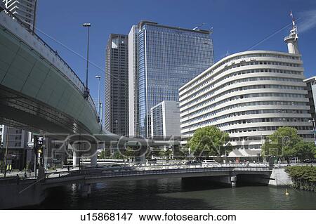 Stock Photo - Buildings and Elevated Roads of Nakanoshima, Osaka Prefecture, Honshu, Japan. Fotosearch