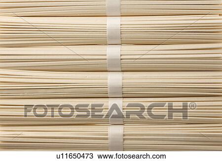Stock Image - Bunches of udon noodles. Fotosearch