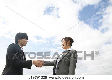 Stock Photo - Businesspeople Shaking Hands. Fotosearch