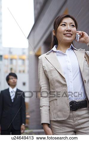 Stock Image - Businesswoman on Mobile Phone. Fotosearch