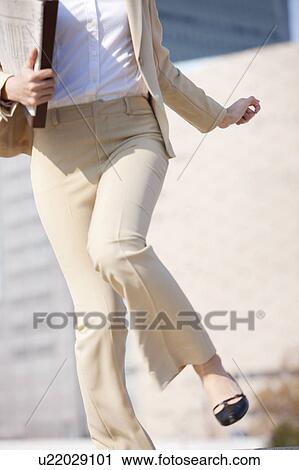 Businesswoman running, Low section View Large Photo Image Stock Image - Businesswoman running, Low section. Fotosearch