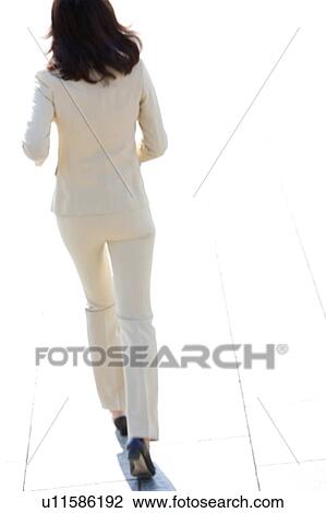 Businesswoman running, Rear view View Large Photo Image Stock Image - Businesswoman running, Rear view. Fotosearch