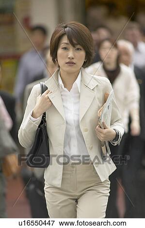 Businesswoman walking View Large Photo Image Stock Photo - Businesswoman walking. Fotosearch