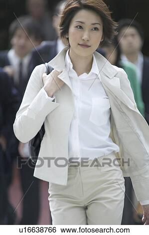 Stock Photograph - Businesswoman walking. Fotosearch