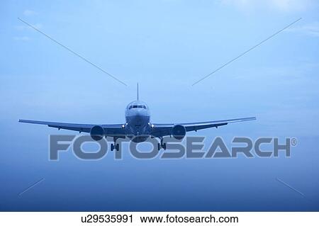 Commercial airplane flying, Japan View Large Photo Image Stock Image - Commercial airplane flying, Japan. Fotosearch