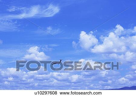Stock Photo - Corporate jet flying, Japan. Fotosearch