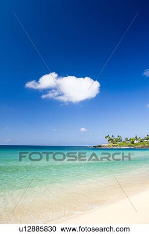 Stock Image - Cumulus Cloud Over Ocean. Fotosearch