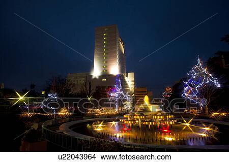 Picture - Fountain and Park Decorated with Winter Lights. Fotosearch