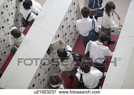 High school student at locker changing shoes, Japan View Large Photo Image Stock Photo - High school student at locker changing shoes, Japan. Fotosearch