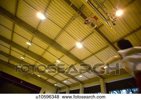 Stock Photo - High school student playing basketball, Japan. Fotosearch