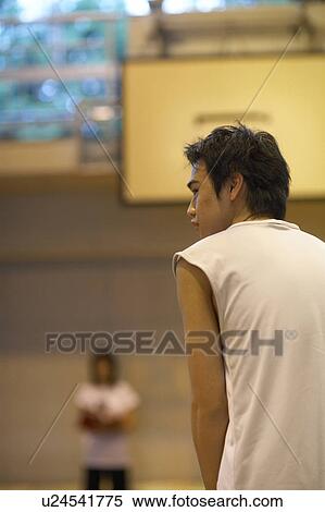 Stock Photography - High school student playing basketball, Japan. Fotosearch