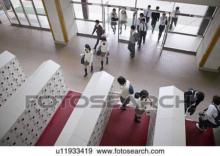 Stock Photo - High school students entering school, Japan. Fotosearch