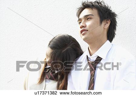 Stock Image - High school students on rooftop, Japan. Fotosearch