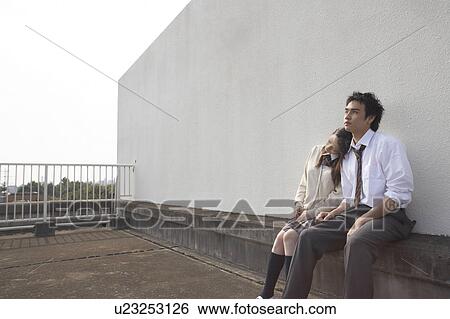 Stock Photograph - High school students on rooftop, Japan. Fotosearch