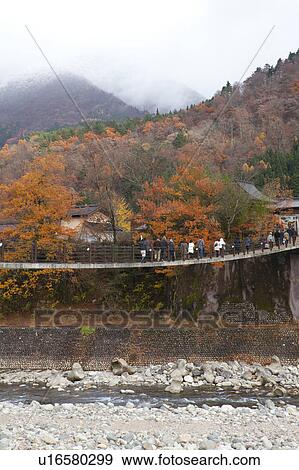 Hikers Crossing Footbridge View Large Photo Image Stock Photo - Hikers Crossing Footbridge. Fotosearch