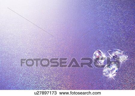 Stock Image - Jewelry and Purple Glitter. Fotosearch