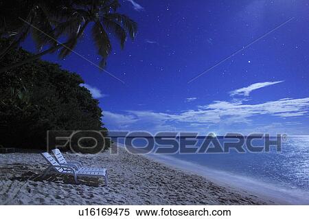 Lounge Chairs on Beach at Night View Large Photo Image Stock Photography - Lounge Chairs on Beach at Night. Fotosearch