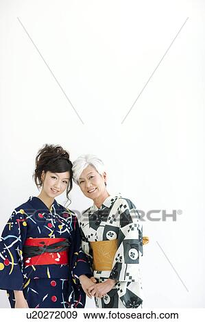 Mother and daughter wearing Yukata View Large Photo Image Stock Photo - Mother and daughter wearing Yukata. Fotosearch