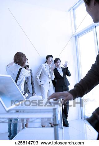 Photographer and his staffs taking photos View Large Photo Image Stock Image - Photographer and his staffs taking photos. Fotosearch