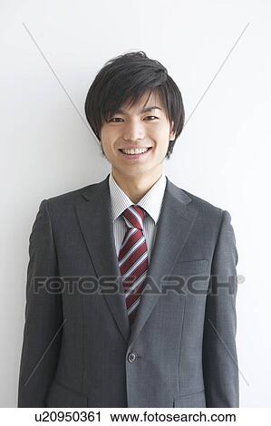 Portrait of a young businessman View Large Photo Image Stock Image - Portrait of a young businessman. Fotosearch