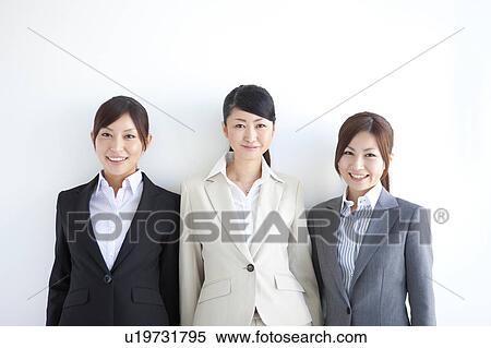 Stock Photography - Portrait of three businesswomen. Fotosearch