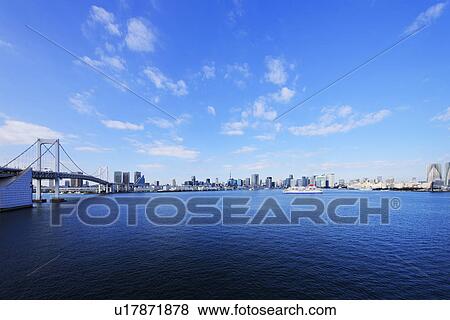 Stock Photo - Rainbow Bridge and Tokyo Skyline. Fotosearch
