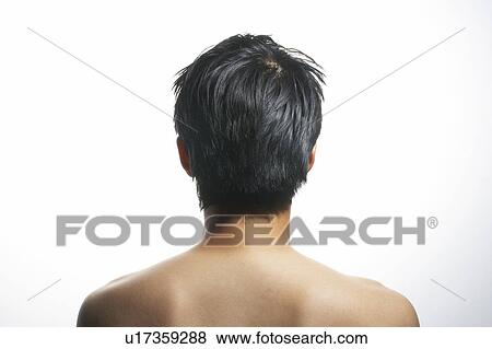 Rear view of a man View Large Photo Image Stock Photo - Rear view of a man . Fotosearch