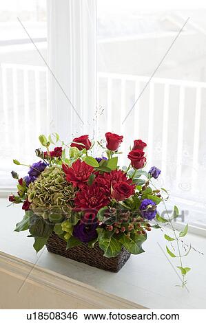 Stock Photograph - Red Bouquet on Window Sill. Fotosearch