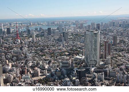 Stock Image - Roppongi Hills and Tokyo Tower, Minato ward, Tokyo Prefecture, Honshu, Japan. Fotosearch