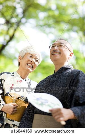 Senior couple wearing Yukata smiling View Large Photo Image Stock Photo - Senior couple wearing Yukata smiling. Fotosearch