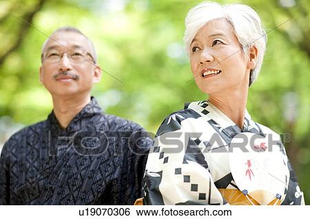 Stock Photograph - Senior couple wearing Yukata . Fotosearch