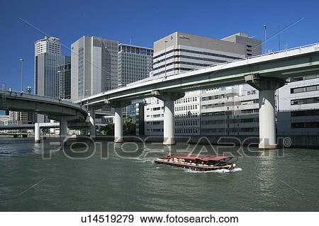 Stock Photo - Skyline of Nakanoshima, Osaka Prefecture, Honshu, Japan. Fotosearch