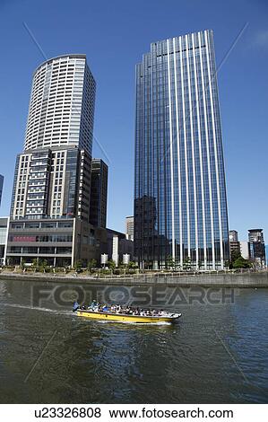 Stock Photo - Skyline of Nakanoshima, Osaka Prefecture, Honshu, Japan. Fotosearch