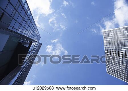 Skyscrapers, low angle view, Osaka Prefecture, Honshu, Japan View Large Photo Image Stock Photo - Skyscrapers, low angle view, Osaka Prefecture, Honshu, Japan. Fotosearch