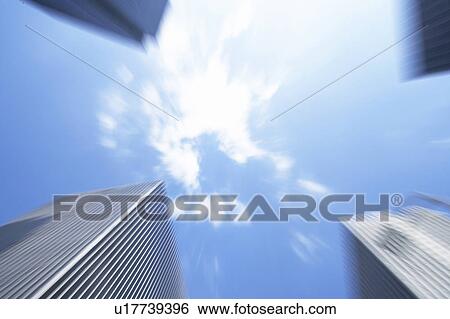 Stock Photograph - Skyscrapers, low angle view, Osaka Prefecture, Honshu, Japan. Fotosearch