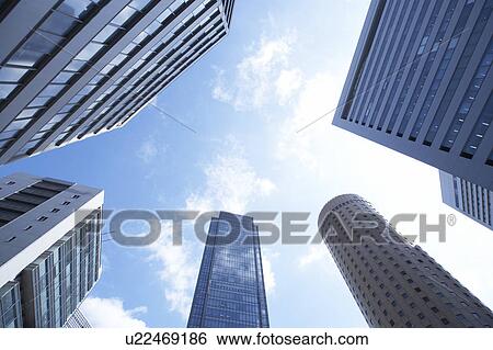 Skyscrapers, low angle view, Osaka Prefecture, Honshu, Japan View Large Photo Image Stock Photograph - Skyscrapers, low angle view, Osaka Prefecture, Honshu, Japan. Fotosearch